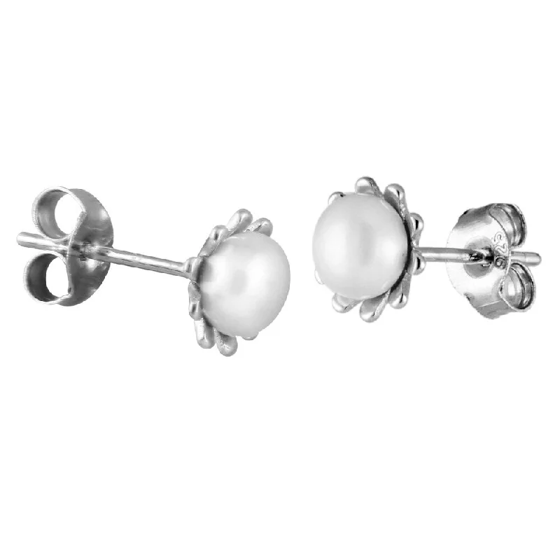 Sterling silver flower shaped earrings with button shaped pearls in the center - White