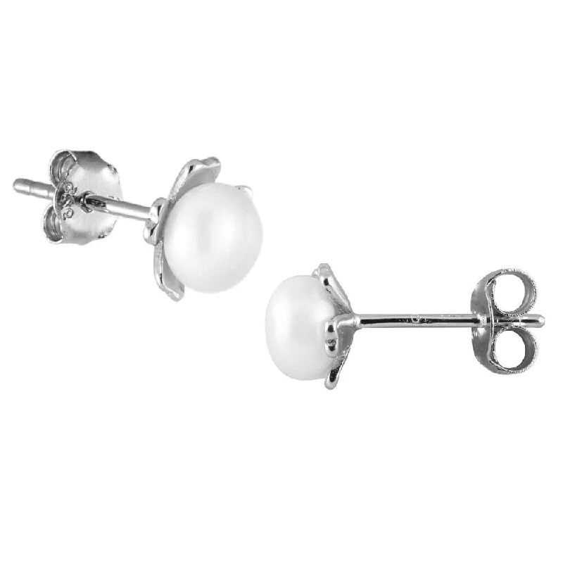 Sterling silver flower shaped earrings with button shaped pearls in the center - White